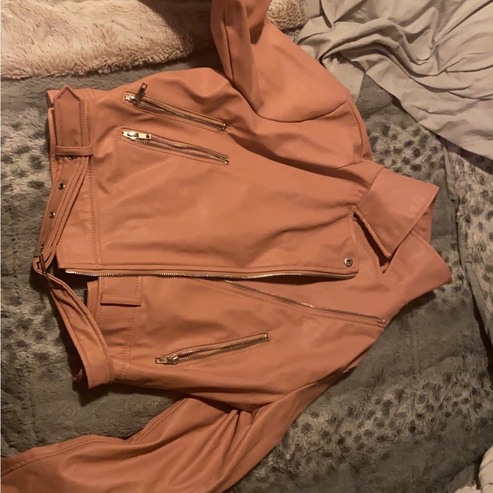 Pink cropped leather jacket